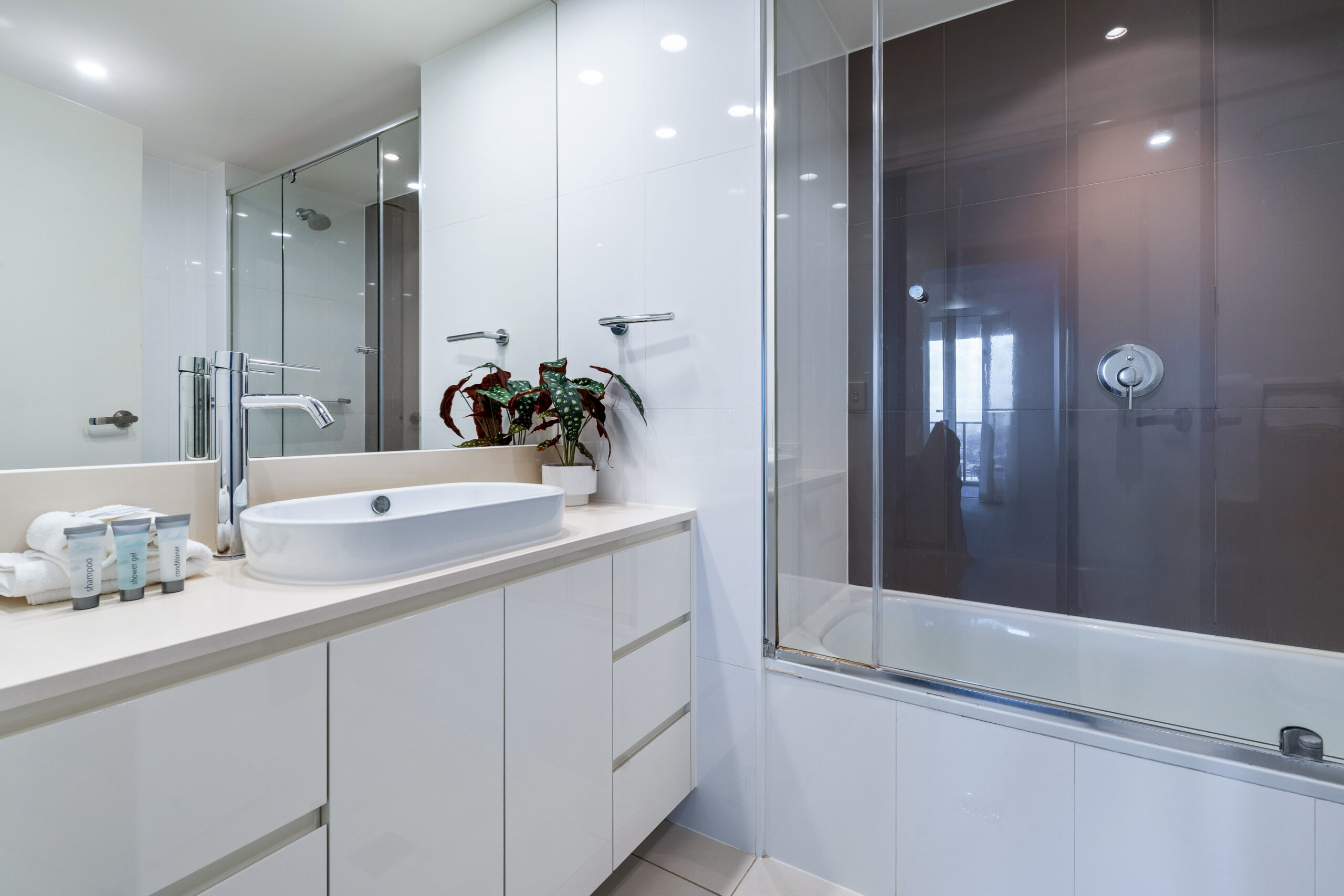 Modern bathroom with shower and vanity