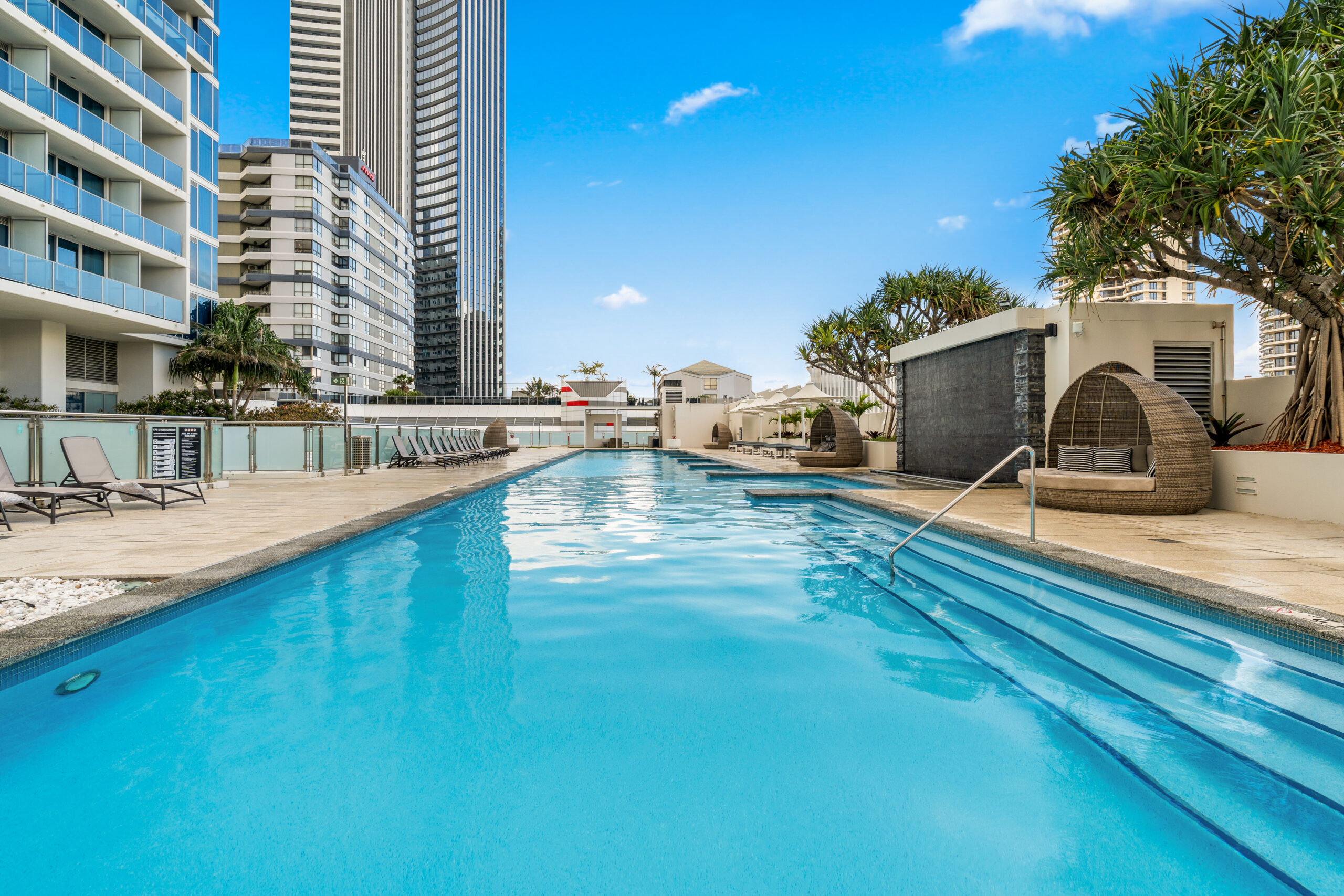 Outdoor pool deck with resort-style seating